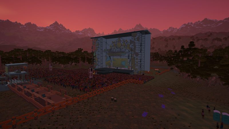 The Main Stage and its crowd under a red sunset sky